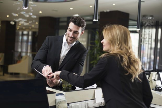 Complaining at hotel desk